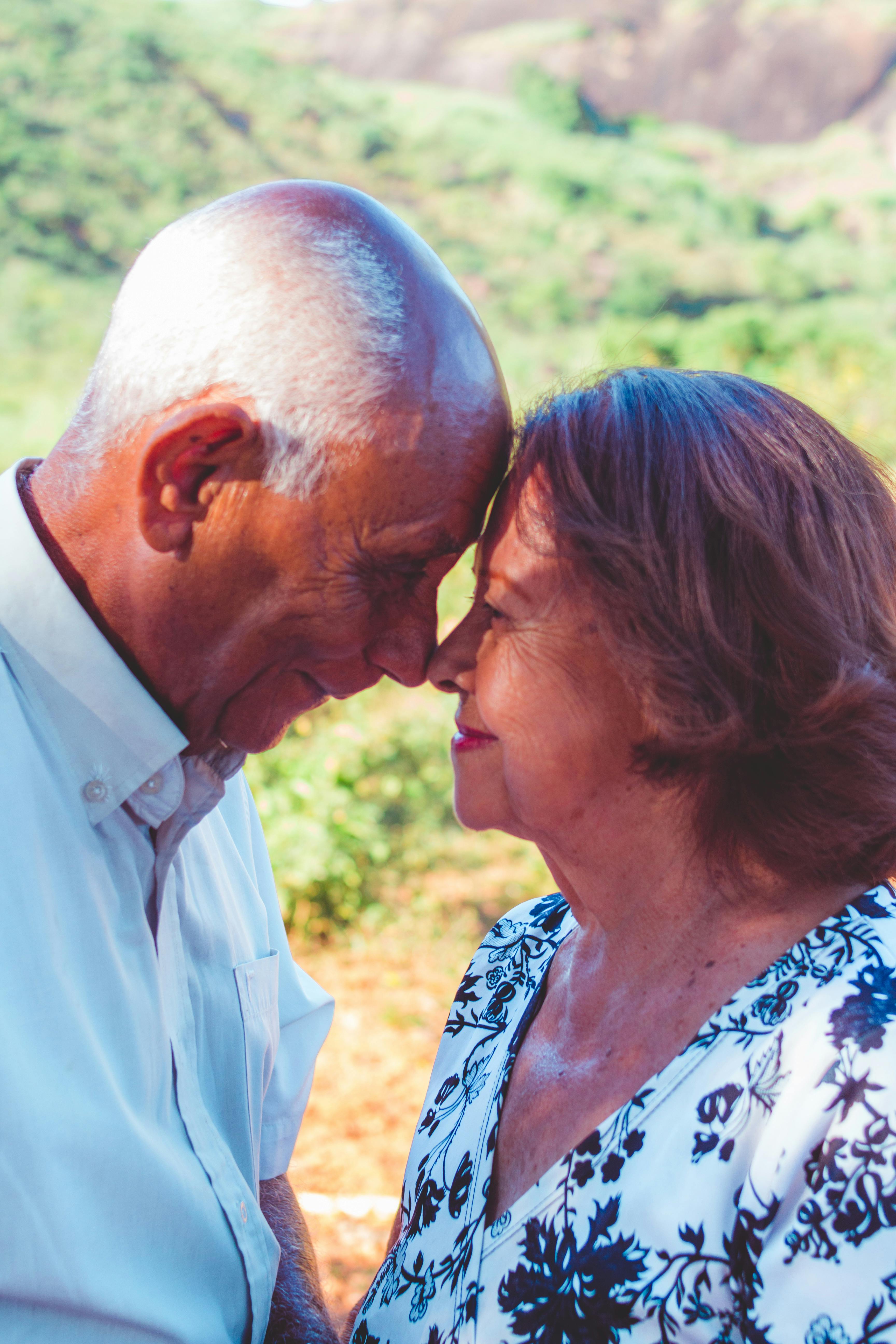 Happy elderly couple smiling
